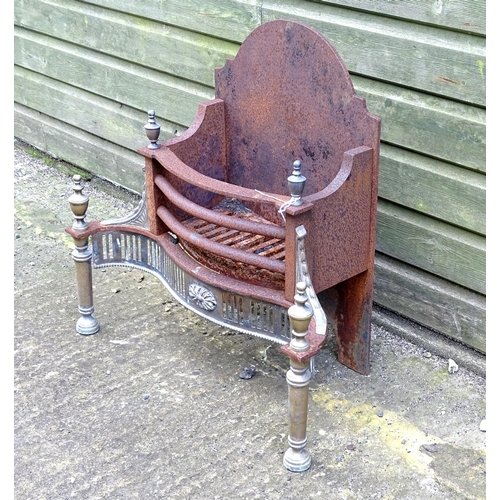 920 - A mid 20thC cast iron and brass fire basket, approx 24