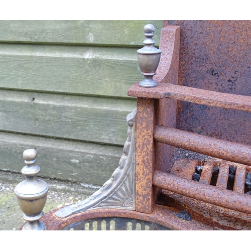 920 - A mid 20thC cast iron and brass fire basket, approx 24