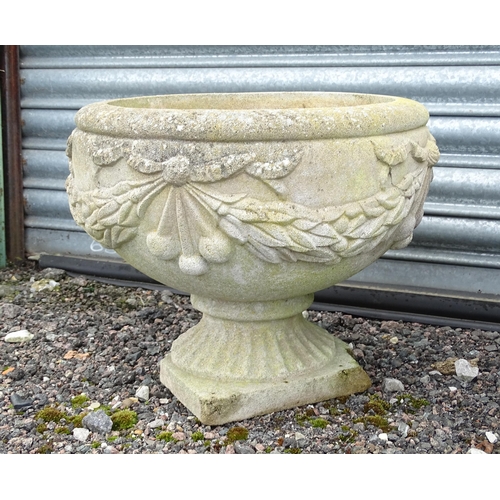 922 - Four matching reconstituted stone pedestal planters with bow and swag detail, each approx 13