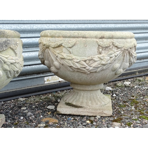 922 - Four matching reconstituted stone pedestal planters with bow and swag detail, each approx 13