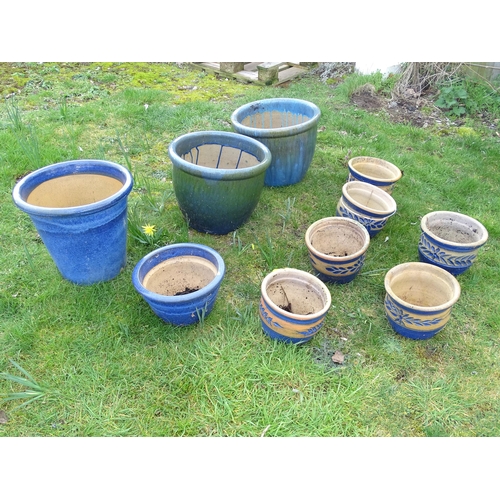 925 - Eight assorted blue glazed ceramic planters and plant pots, the largest 13 1/2