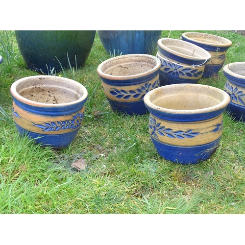 925 - Eight assorted blue glazed ceramic planters and plant pots, the largest 13 1/2