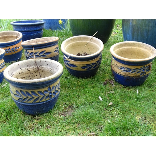 925 - Eight assorted blue glazed ceramic planters and plant pots, the largest 13 1/2