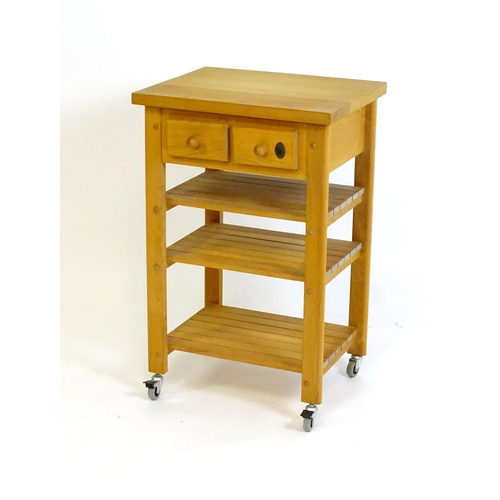 930 - An oak and beech Kitchen side unit / trolley / butcher's block. 22