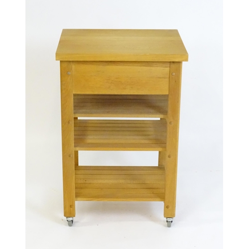 930 - An oak and beech Kitchen side unit / trolley / butcher's block. 22