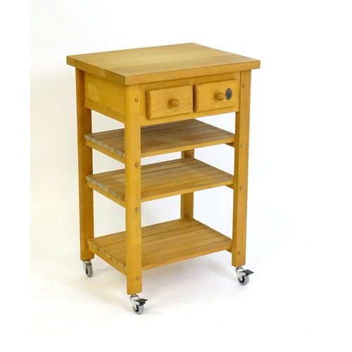 930 - An oak and beech Kitchen side unit / trolley / butcher's block. 22