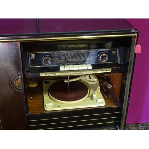 931 - A mid 20thC Grundig Radiogram , with turntable, tuner and microphone, approx 48