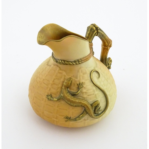 122 - A Royal Worcester blush ivory jug with basket weave style decoration and relief lizard detail. Marke... 