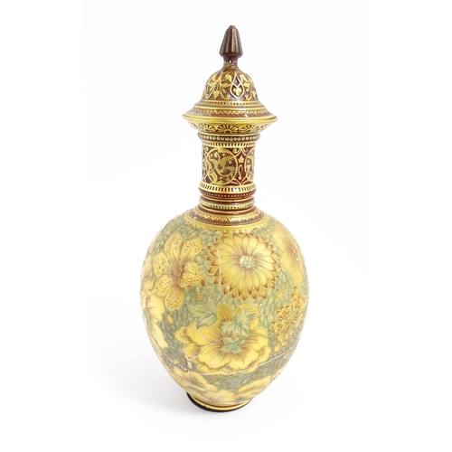 123 - A Victorian Royal Crown Derby bottle vase and cover with gilt floral decoration. Marked under with r... 