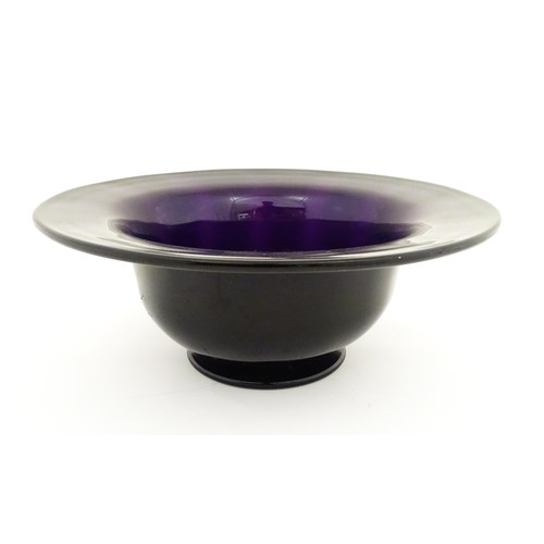 242 - A Victorian amethyst glass centrepiece bowl. Approx. 6 1/4