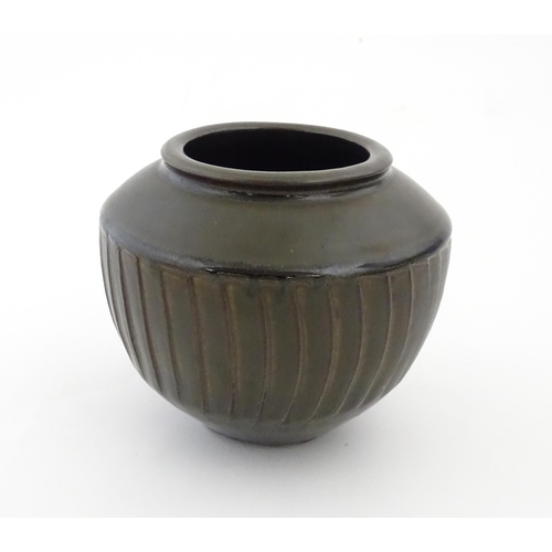 97 - A David Leach studio pottery vase / pot of tapering form with a unique gunmetal glaze commissioned b... 