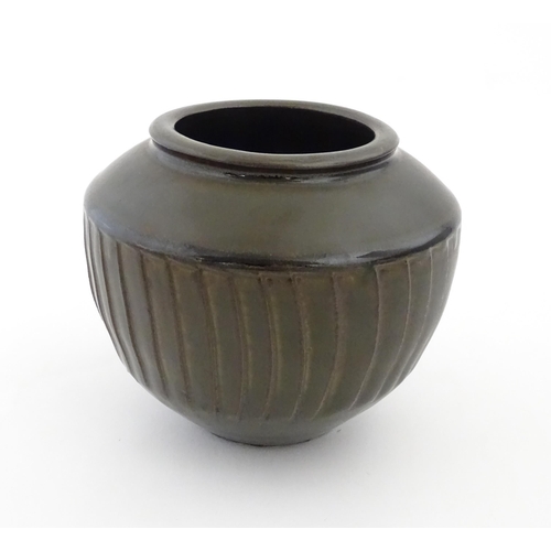 97 - A David Leach studio pottery vase / pot of tapering form with a unique gunmetal glaze commissioned b... 