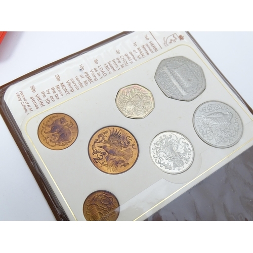 894 - Coins: A quantity of assorted coin sets to include The Twenty Pence Pieces - United Kingdom, Isle of... 