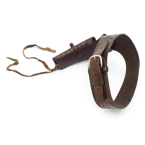 934 - Militaria: a western pistol belt / bandolier with holster and provision for 11 bullets, the leather ... 