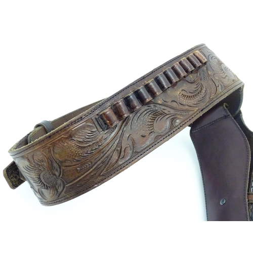 934 - Militaria: a western pistol belt / bandolier with holster and provision for 11 bullets, the leather ... 