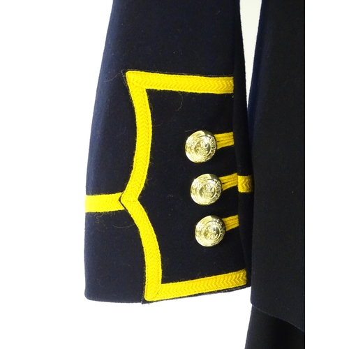 940 - Militaria : a Royal Marines bandsman's No.1 full dress uniform, the single-breasted tunic with regim... 