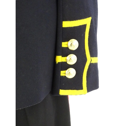 940 - Militaria : a Royal Marines bandsman's No.1 full dress uniform, the single-breasted tunic with regim... 