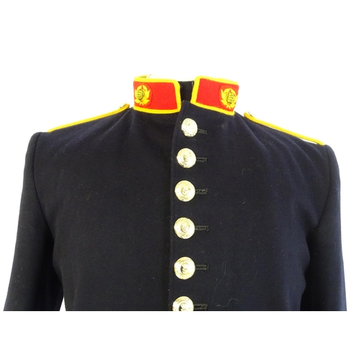 940 - Militaria : a Royal Marines bandsman's No.1 full dress uniform, the single-breasted tunic with regim... 