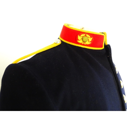 940 - Militaria : a Royal Marines bandsman's No.1 full dress uniform, the single-breasted tunic with regim... 