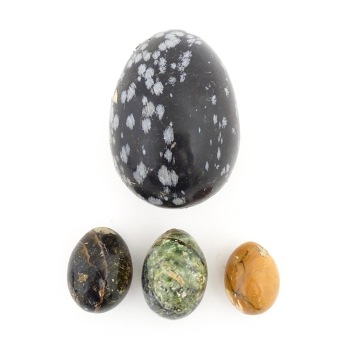 1091 - Natural History / Geology Interest: Four assorted polished hardstone specimen eggs. Largest approx. ... 