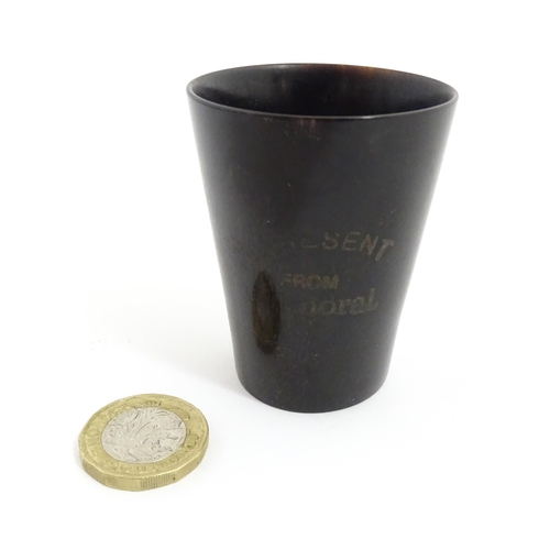 1158 - A Victorian souvenir horn tot cup of tapering form marked A Present from Balmoral. Approx. 2 1/2