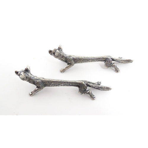 1163 - Three pairs of 20thC silver plate novelty knife rests modelled as hares, foxes and boars. Approx. 3 ... 