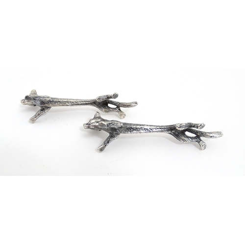 1163 - Three pairs of 20thC silver plate novelty knife rests modelled as hares, foxes and boars. Approx. 3 ... 