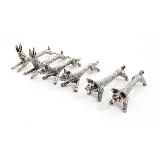 1163 - Three pairs of 20thC silver plate novelty knife rests modelled as hares, foxes and boars. Approx. 3 ... 