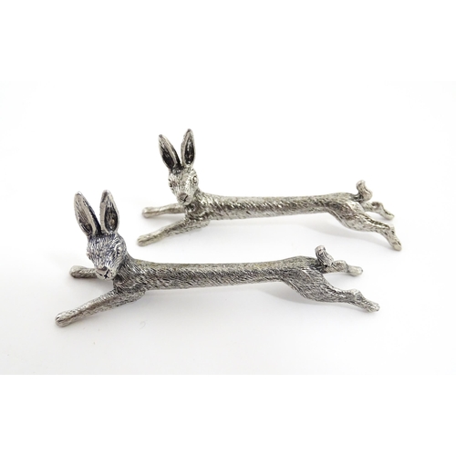 1163 - Three pairs of 20thC silver plate novelty knife rests modelled as hares, foxes and boars. Approx. 3 ... 