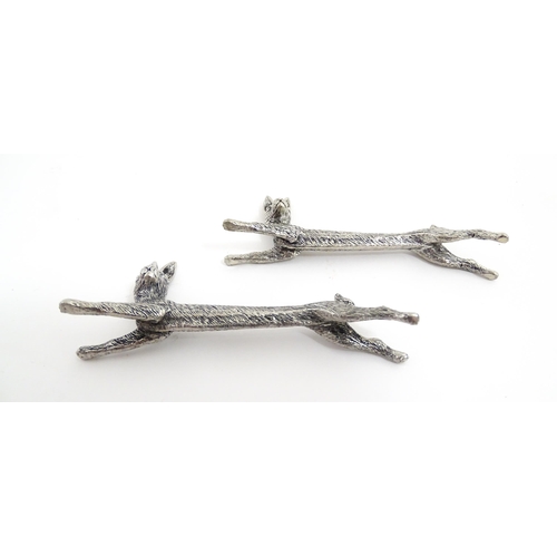 1163 - Three pairs of 20thC silver plate novelty knife rests modelled as hares, foxes and boars. Approx. 3 ... 