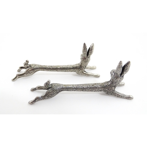 1163 - Three pairs of 20thC silver plate novelty knife rests modelled as hares, foxes and boars. Approx. 3 ... 