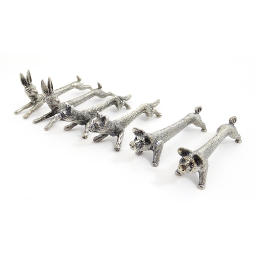 1163 - Three pairs of 20thC silver plate novelty knife rests modelled as hares, foxes and boars. Approx. 3 ... 