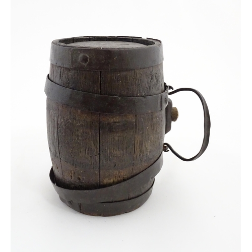 1165 - A Victorian coopered oak barrel with swing. With initials HFB to one end. Approx. 9