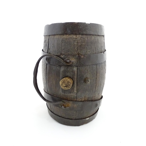 1165 - A Victorian coopered oak barrel with swing. With initials HFB to one end. Approx. 9