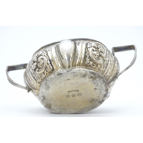 262 - Three silver items to include a twin handled salt hallmarked Birmingham 1899, maker William Hair Has... 