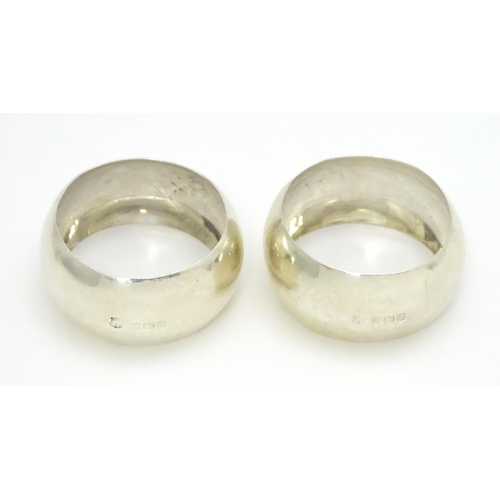 264 - A pair of silver napkin rings hallmarked Birmingham 1910, maker John Sherwood & Sons. (2)