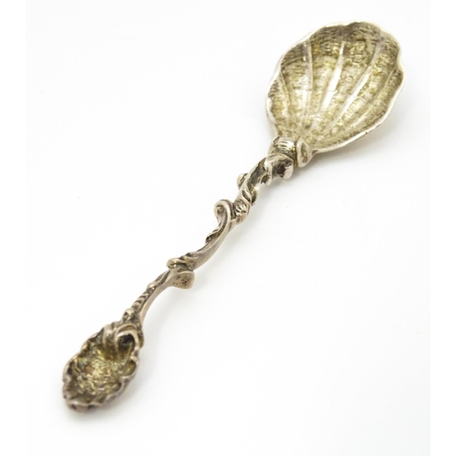 340 - A Victorian silver spoon with shell formed bowl hallmarked Birmingham 1894, maker John Millward Bank... 