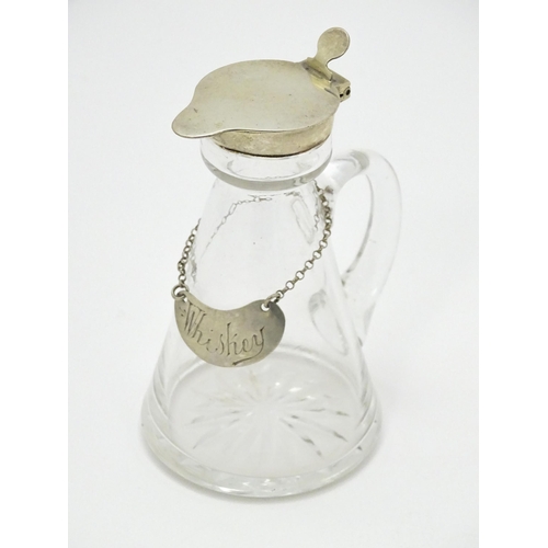 343 - A glass whisky water noggin / jug with silver lid, hallmarked Birmingham 1916 maker Hukin & Heath Lt... 