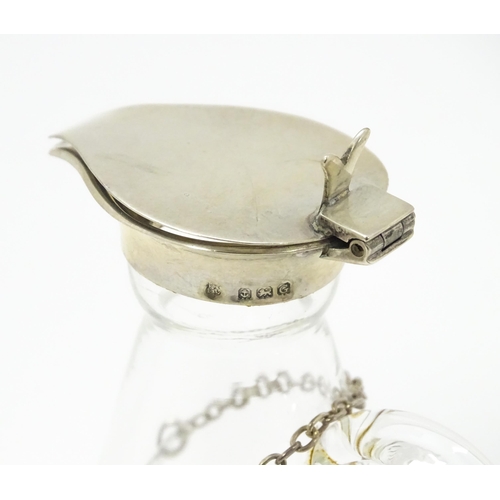 343 - A glass whisky water noggin / jug with silver lid, hallmarked Birmingham 1916 maker Hukin & Heath Lt... 