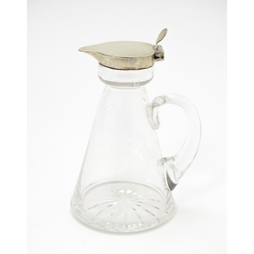 343 - A glass whisky water noggin / jug with silver lid, hallmarked Birmingham 1916 maker Hukin & Heath Lt... 