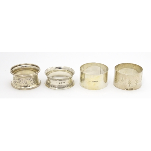 345 - Four assorted silver napkin rings hallmarks to include Birmingham 1898, maker Joseph Gloster, Birmin... 