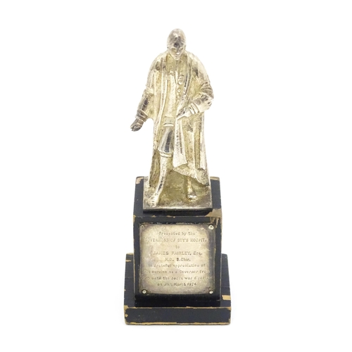 346 - A silver model of Thomas Guy, founder of Guy's Hospital, hallmarked London 1973, maker Garrard & Co ... 