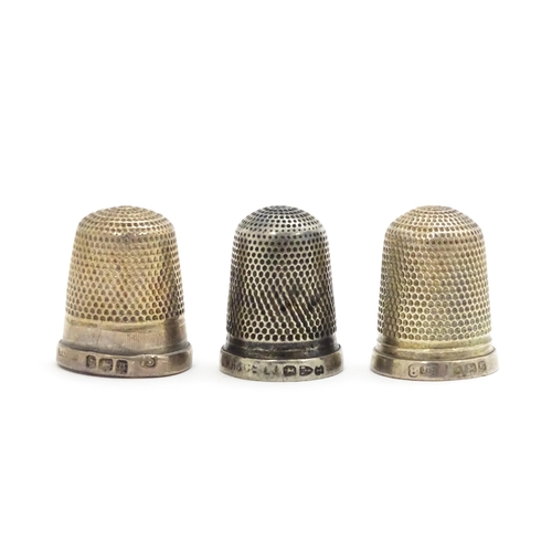 356 - Three silver thimbles hallmarked Birmingham 1926 maker Northern Goldsmiths Co., Chester 1892 maker G... 