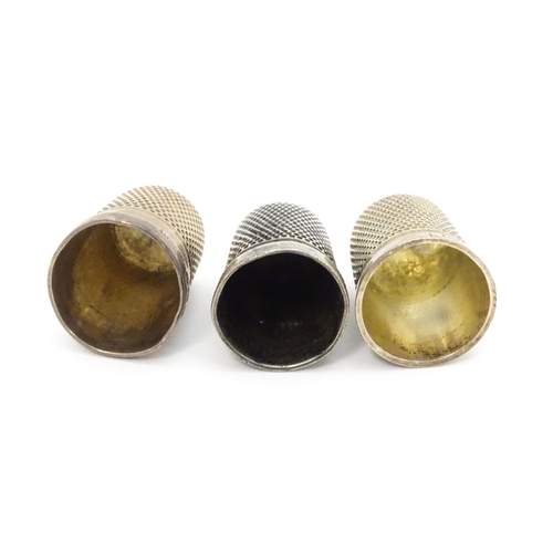 356 - Three silver thimbles hallmarked Birmingham 1926 maker Northern Goldsmiths Co., Chester 1892 maker G... 