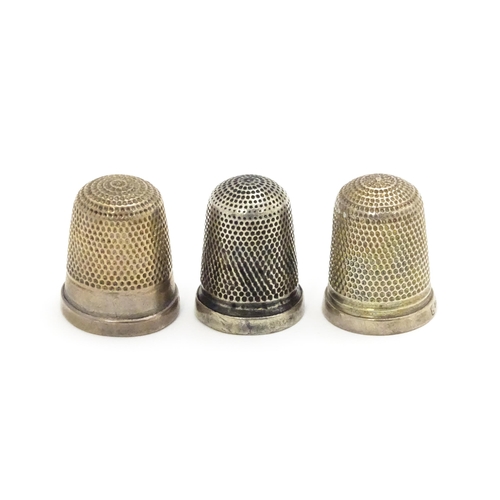 356 - Three silver thimbles hallmarked Birmingham 1926 maker Northern Goldsmiths Co., Chester 1892 maker G... 