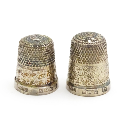 364 - Two silver thimbles hallmarked Birmingham 1928 maker Henry Griffith & Sons Ltd and Birmingham 1925 H... 