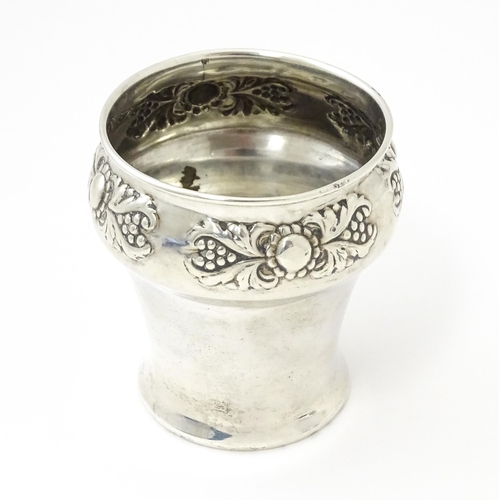 270 - A silver pot of tapering form with embossed decoration, hallmarked London 1904, maker Edward Barnard... 