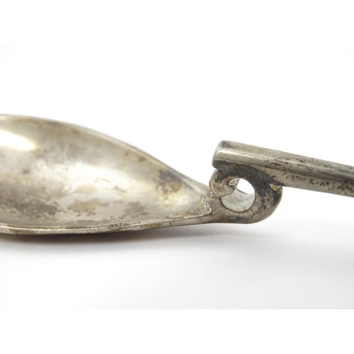 254 - A silver replica of a Roman Christening spoon, indistinctly marked. Approx. 8 1/4