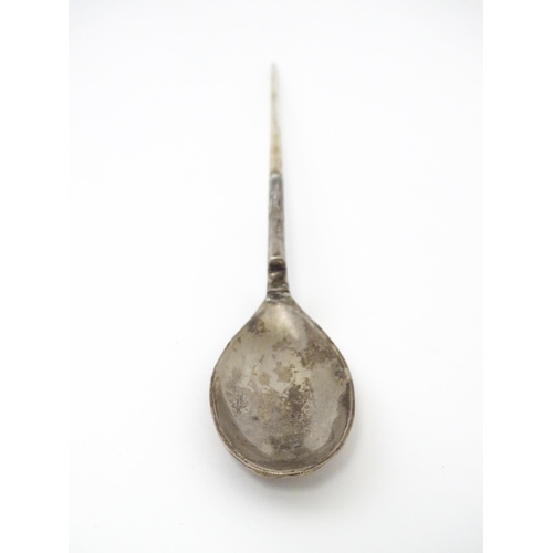 254 - A silver replica of a Roman Christening spoon, indistinctly marked. Approx. 8 1/4