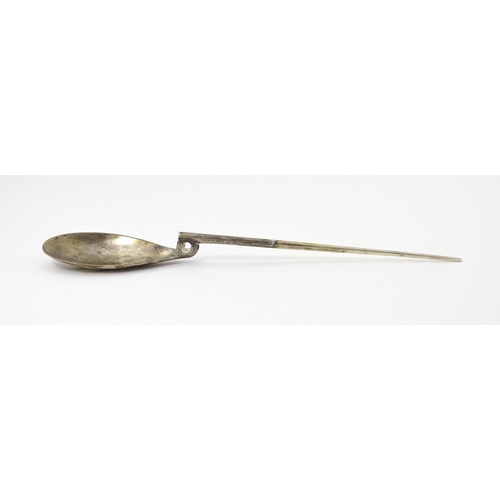 254 - A silver replica of a Roman Christening spoon, indistinctly marked. Approx. 8 1/4